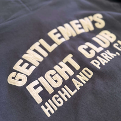 Dark Grey shirt with beige embroidered text 'Gentlemen's Fight Club Highland Park'.
