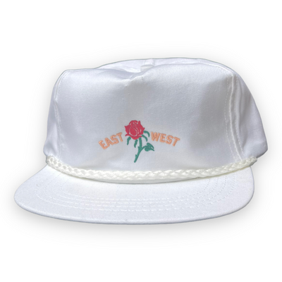 white hat with rope and embroidery of rose and east west