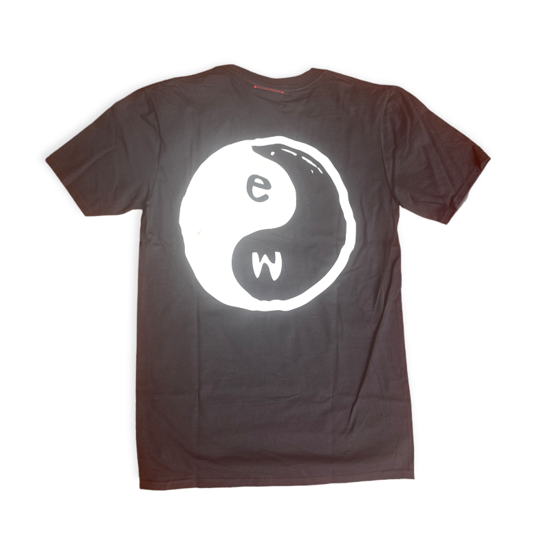 Black shirt with large white yin yang with an e and a w in it