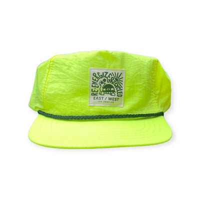 Nylon Neon Yellow hat with turtle label that reads "East West Los Angeles Reenergized Recycled"