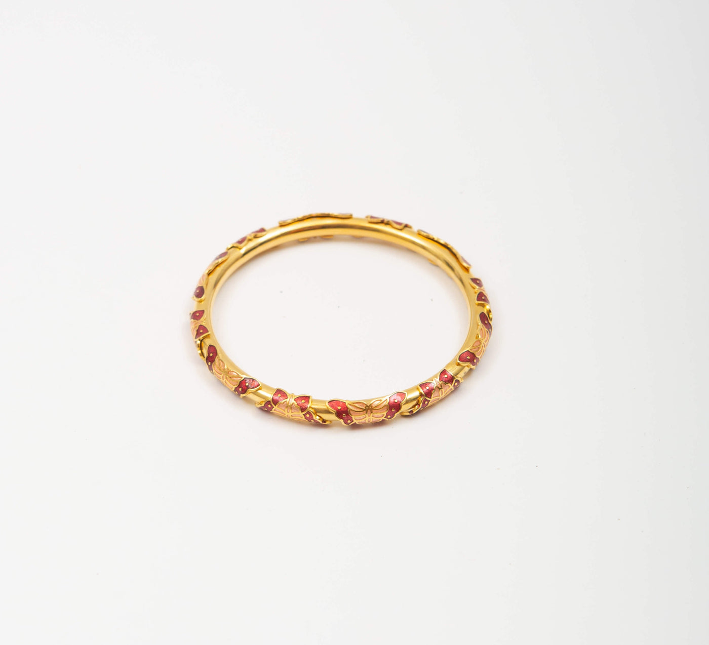 Gold toned bracelet with red cloisonne butterflies attached