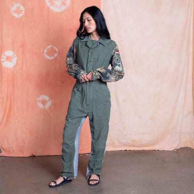 Vietnam Era US Military Jumpsuit on the body, German camo on the sleeves and Denim showing from the back on the legs.  Remade by Tay Trong.