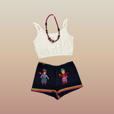 Natural Colored tank top paired with knit shorts and a beaded necklace. Sold separately