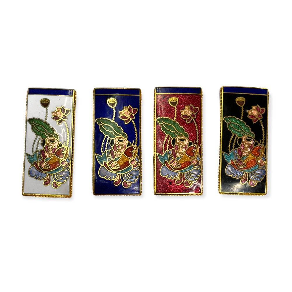 Cloisonne colored money clips with Buddha and Lotus design in the following order from left to right. White, Blue, Burgundy, Black.